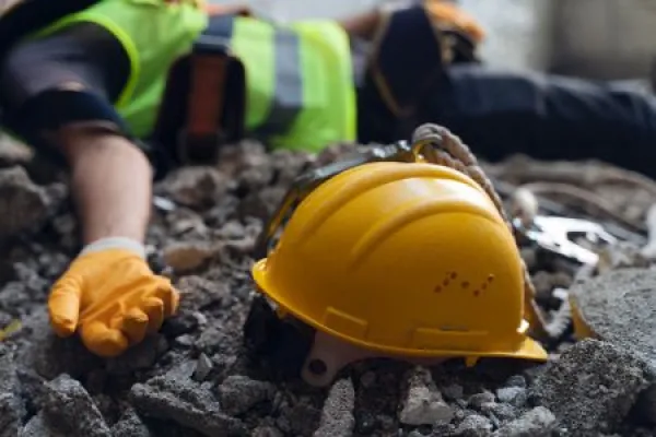 Construction worker has an accident while working on new house.