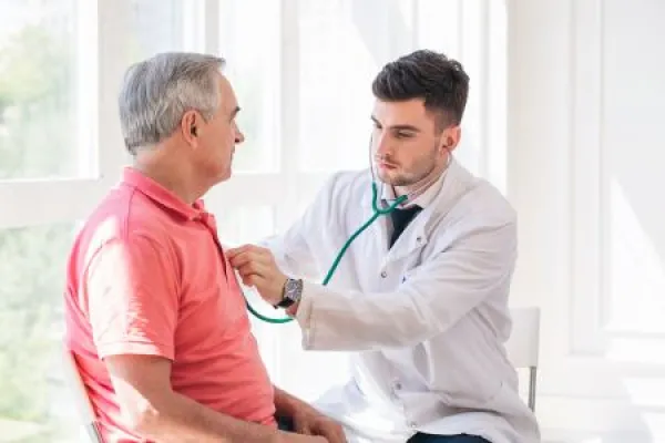 Senior man being examined by a doctor